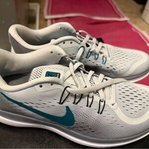 Grey and green Nikes